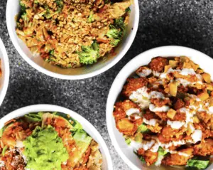 Three loaded brunch bowls from daily eats