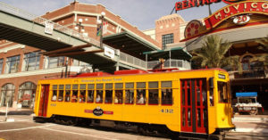 Exterior of a yellow and red electric streetcar