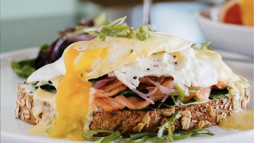 Photo of avocado toast topped with a fried egg