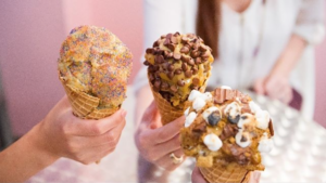 photo of edible cookie dough scoops in waffle cones