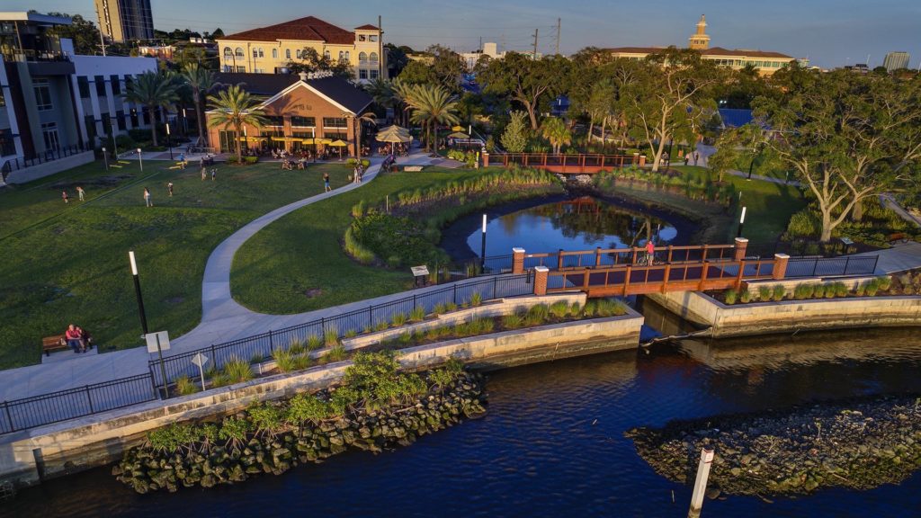 Aerial view of a waterfront restaurant/food hall in the city of Tampa