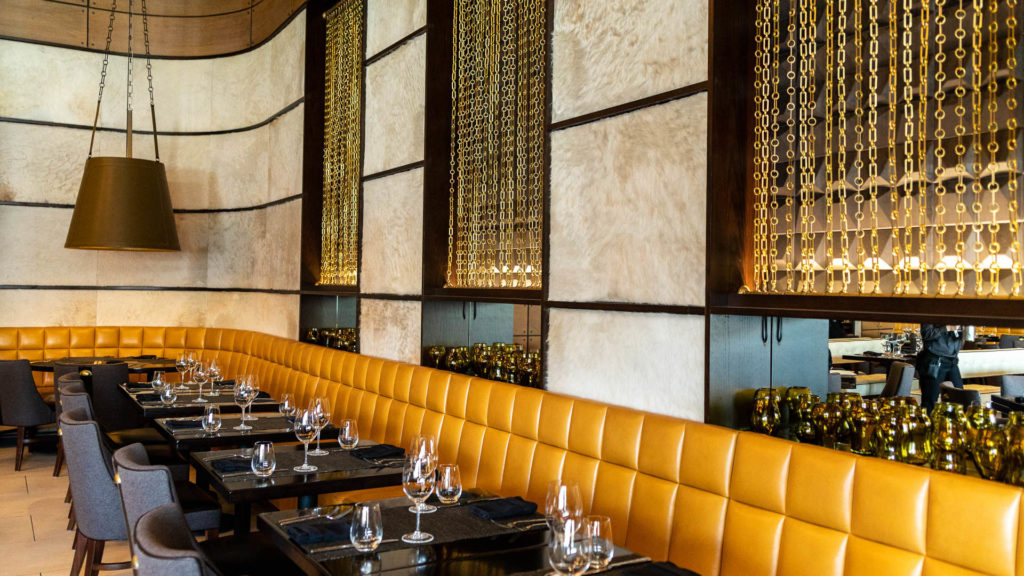Inside a new steakhouse with gold interiors