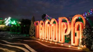 Exterior of a lit up sign that reads Tampa