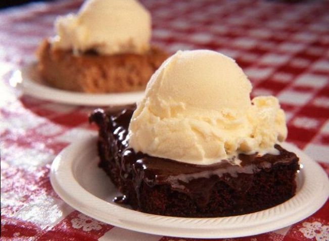 warm chocolate cake with ice cream on top
