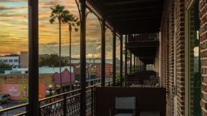 balcony view at sunset from a historic hotel