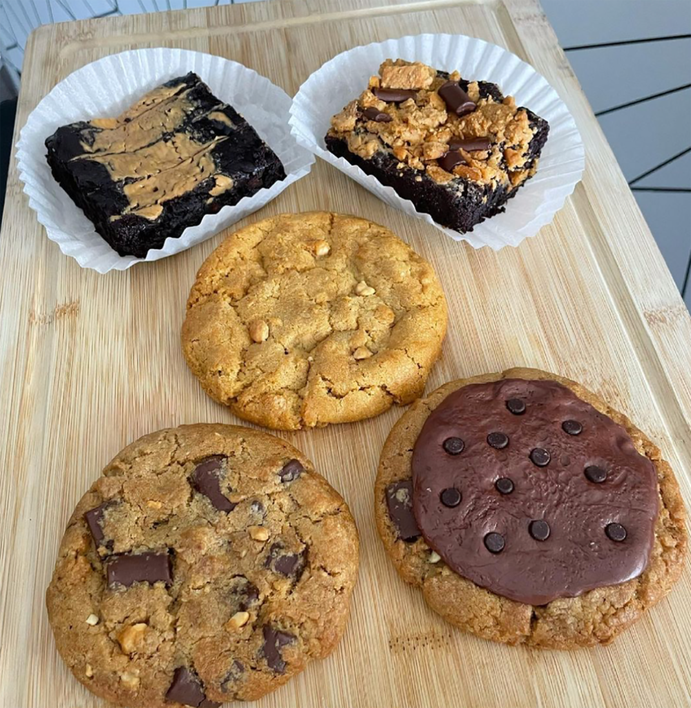 assortment of chocolate and peanut butter covered cookies