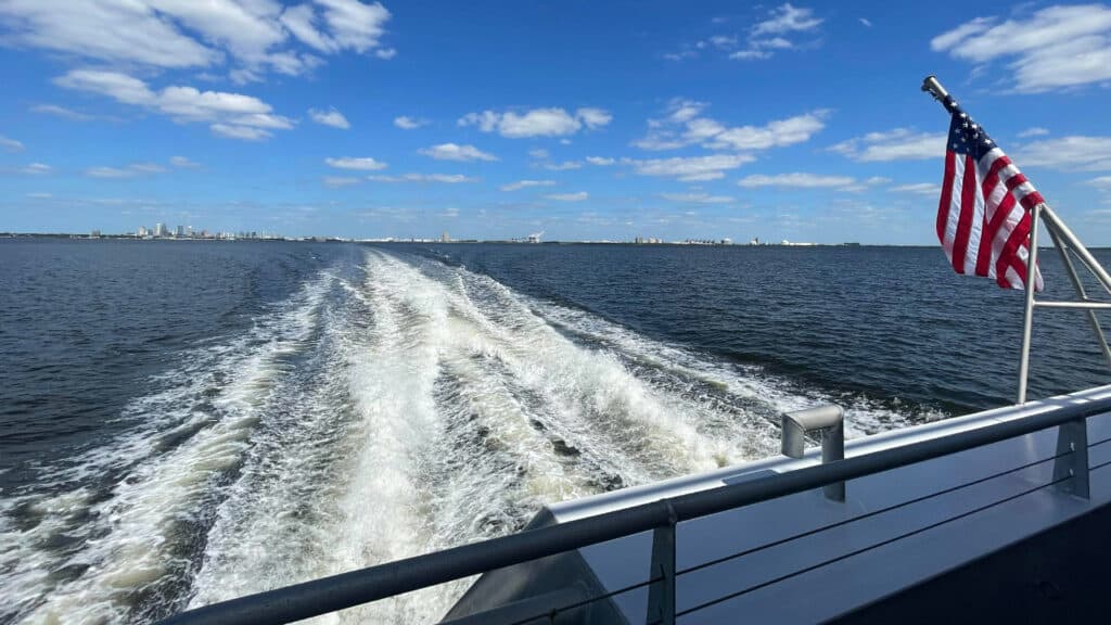 View of the water from the back of the Cross-Bay Ferry as it travels from Tampa to St. Pete
