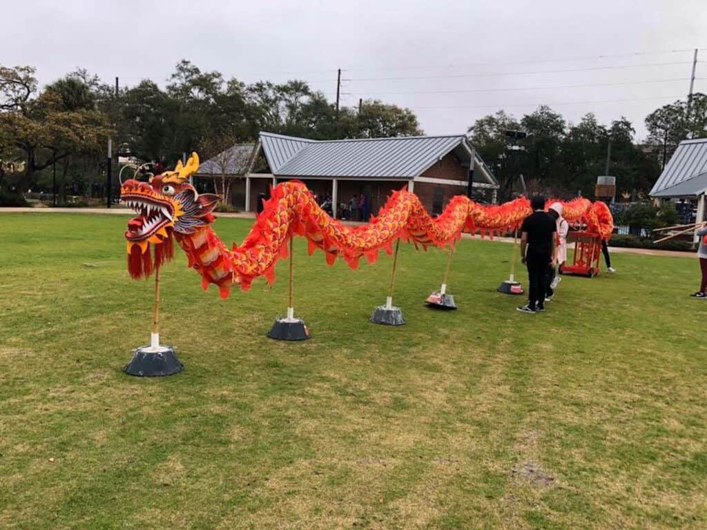 Large red dragon set up in the park