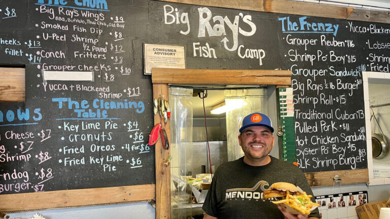 The owner of Big Ray's Fish Camp in Tampa standing inside his restaurant