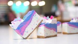 Multiple bars of soap with pink, purple, white and blue pigments
