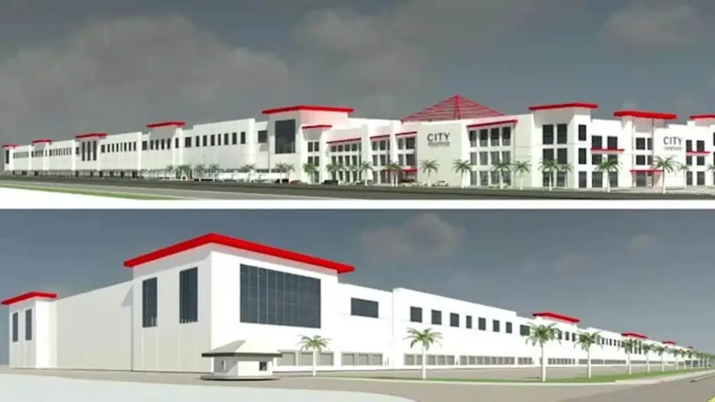 Rendering of a large warehouse with tall windows on the second floor. Red slanted roofs are shown on both sides