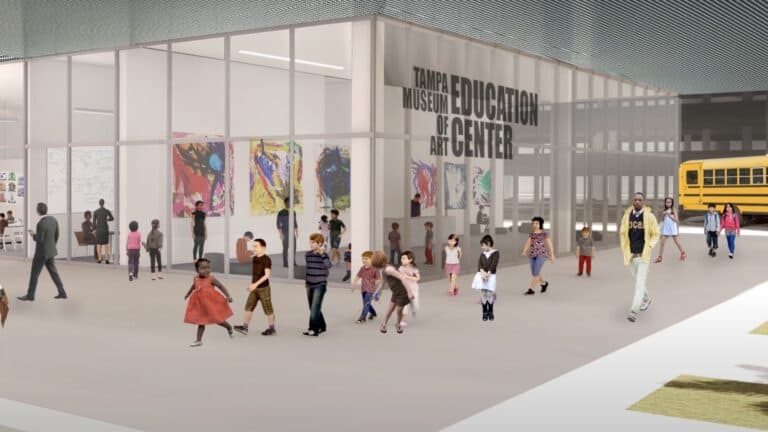 Rendering of an education center with wrap around glass windows and doors. A mural is painted on the window as guests walk around outside the structure.