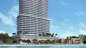 rendering of a waterfront condo tower. The ground level is slightly wider than the top floors. The building is surrounded by trees.