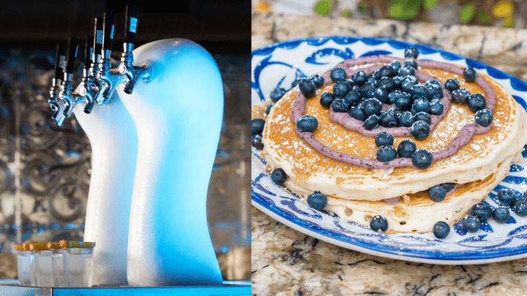 three tequila taps next to a plate with two pancakes covered in blueberries