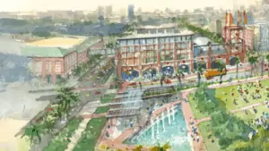 Rendering of a downtown area with a boardwalk, greenery and brick buildings.