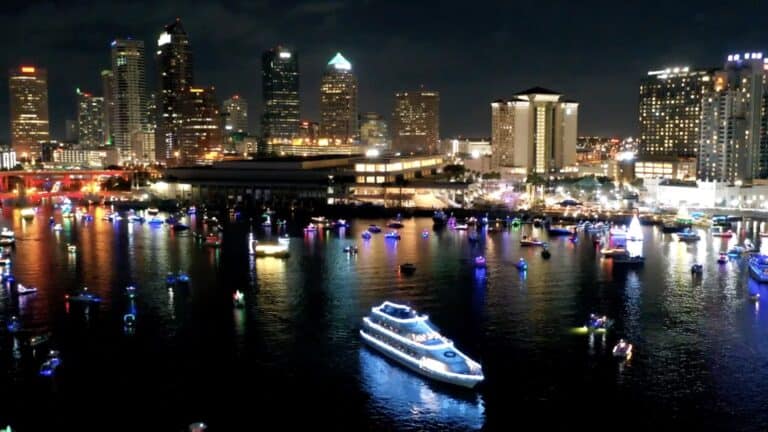 aerial view of a lighted boat parade