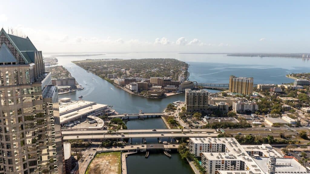a rooftop view of Tampa, Florida. A river is visible.