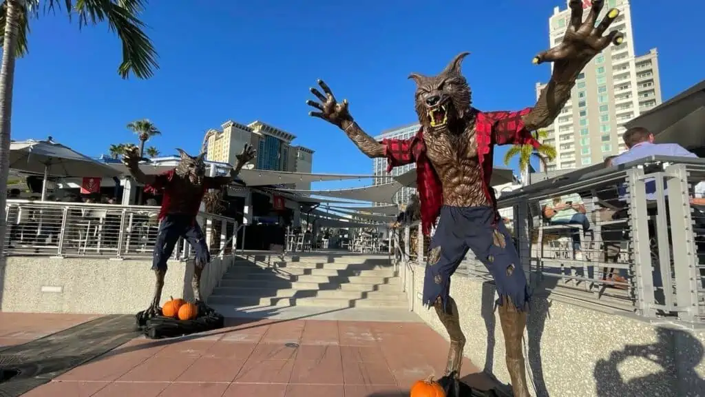 zombie and were wolf statues arranged on the waterfront