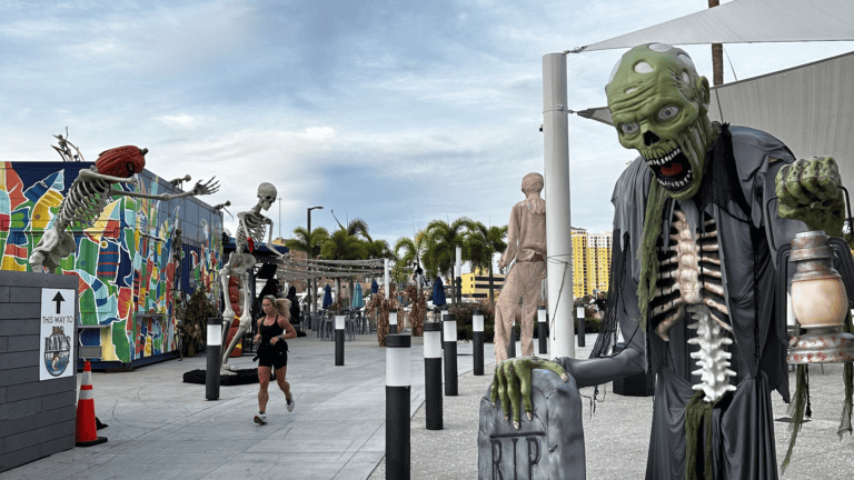 zombie and were wolf statues arranged on the waterfront