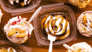 A large cinnamon roll covered in icing