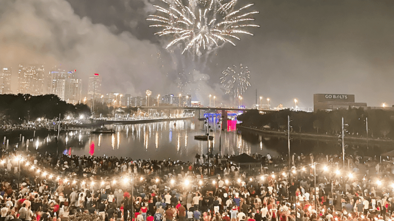 a big fireworks display on the waterfront