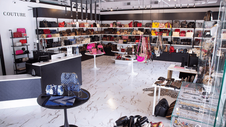 inside a high end boutique filled with designer purses