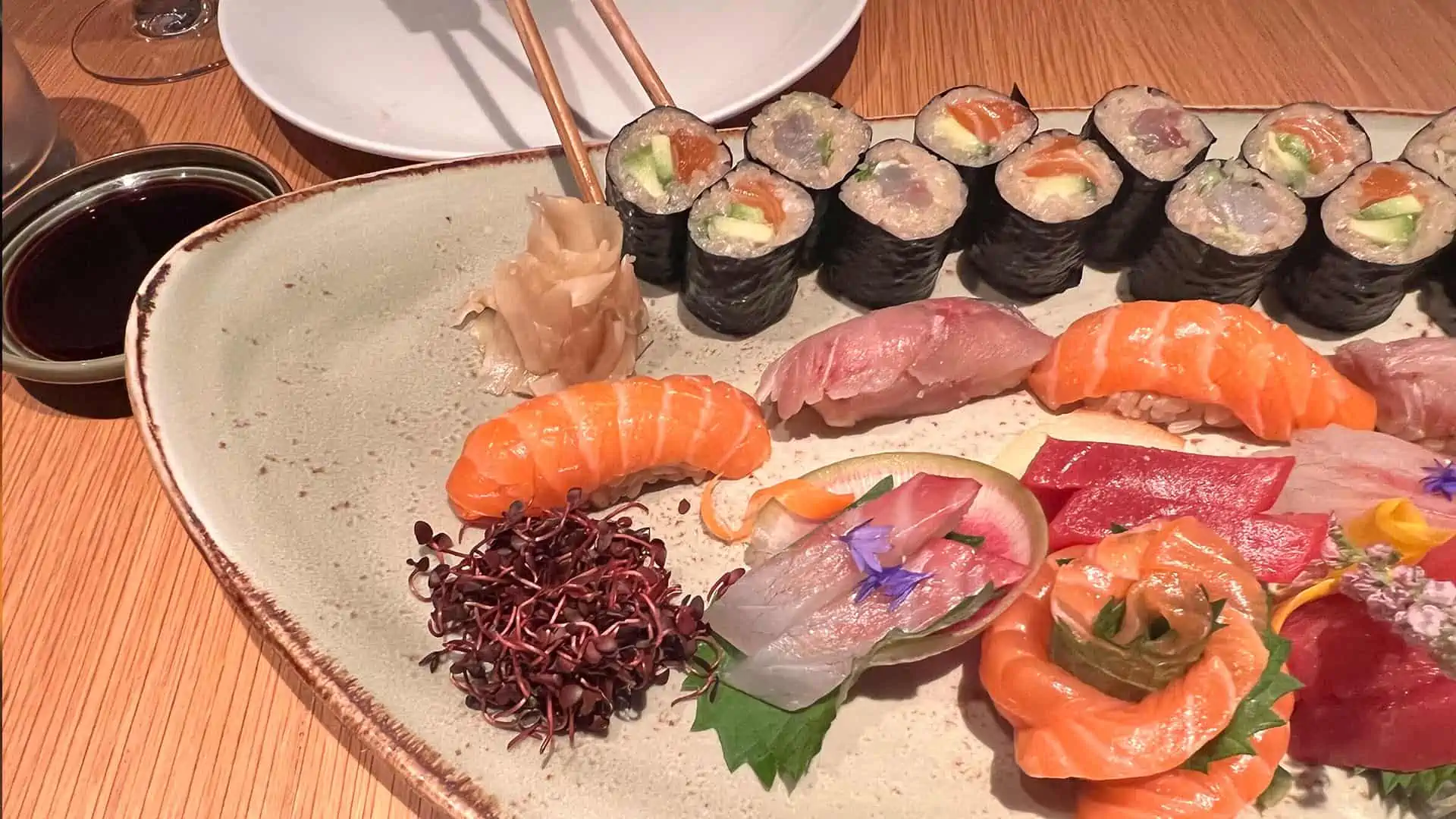 A large plate of a variety of sushi and sashimi at upscale Japanese eatery Bisushima in London