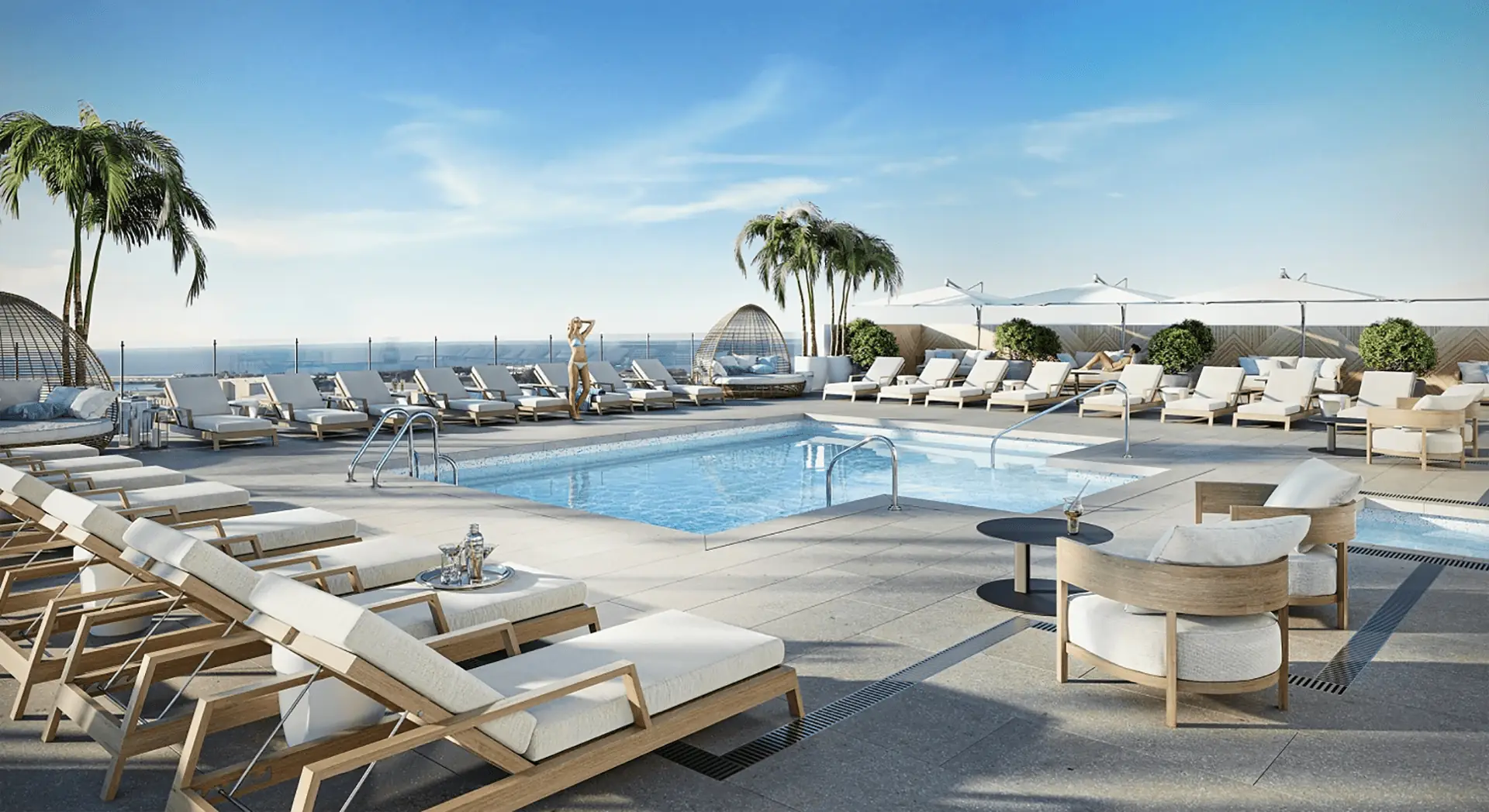 Rendering of a rooftop pool with lounge chairs surrounding the pool.