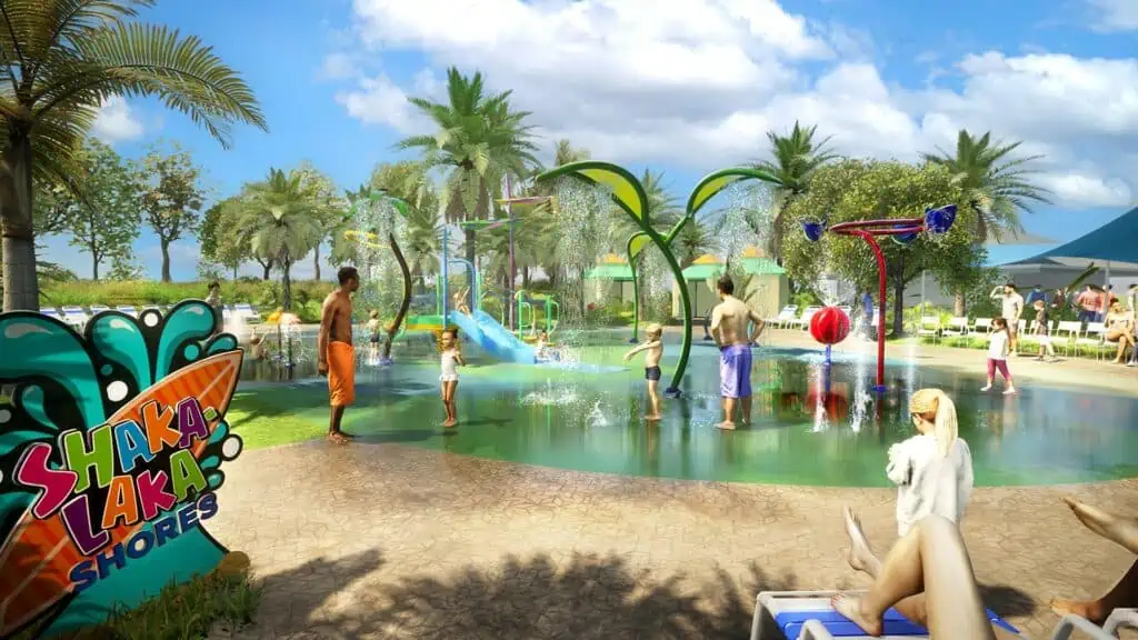 Rendering of a new plash zone at a water park. There's a beach shore area, and palm trees in the background.