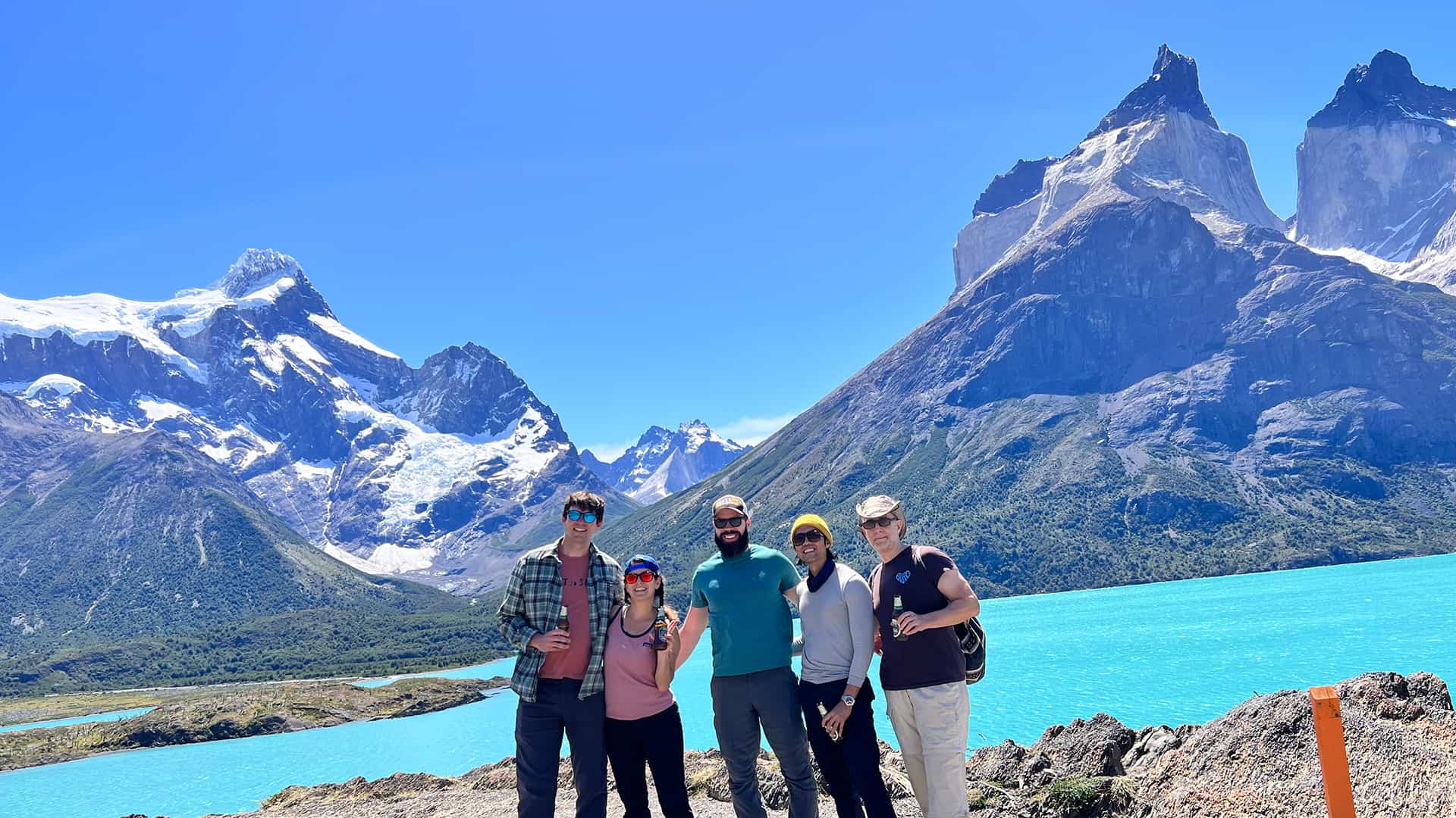 Author with friends at the base of Torres del Paine at the end of hike