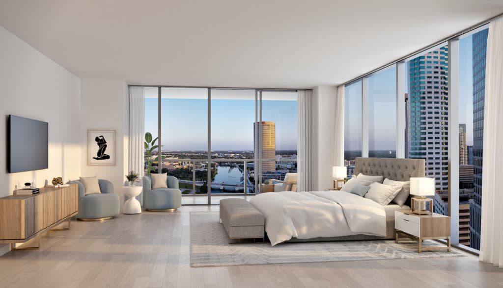 rendering of a hotel room with a panoramic view of a downtown area.