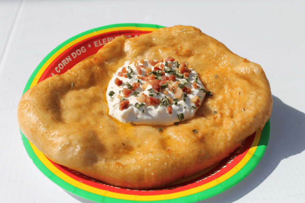 giant fried pastry with veggies and cream I the center