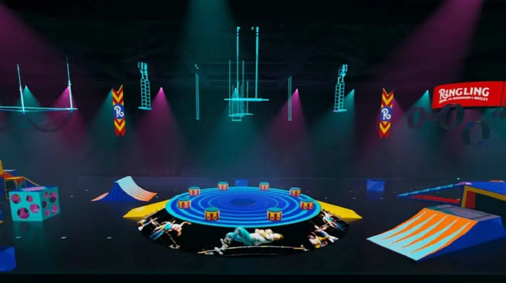 Rendering of a circus arena complete with ramps, a center ring, trapezes and more.