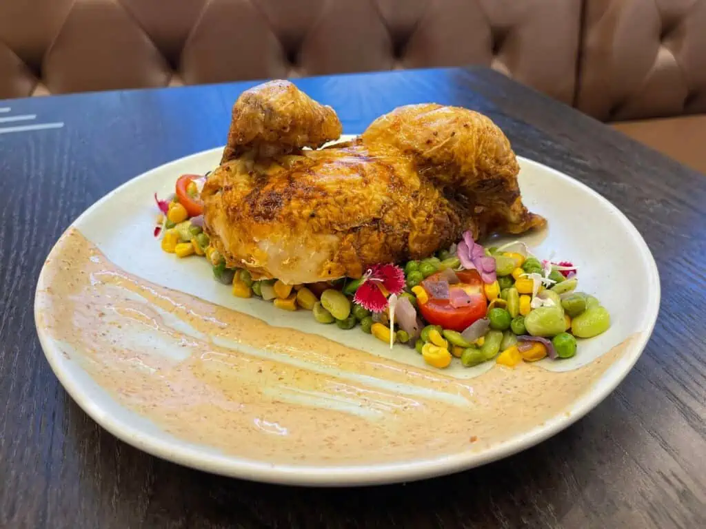 half chicken on a plate