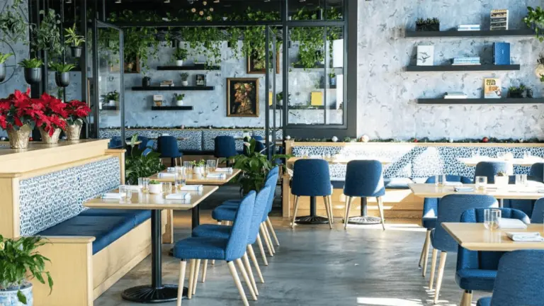 interior of a restaurant with long wooden tables