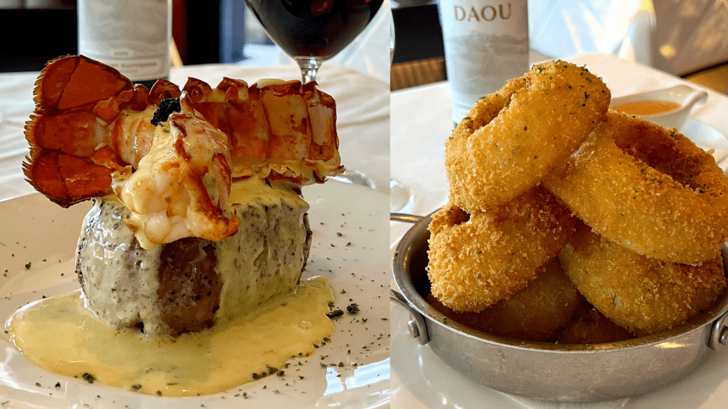 steak and seafood plated on one side, tons of onion rings on the other side. 