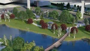 rendering of waterfront park with a bridge connecting two grassy areas.
