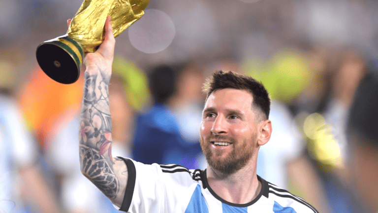 Lionel Messi holding a trophy