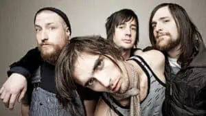 all-american rejects posing in front of a white background