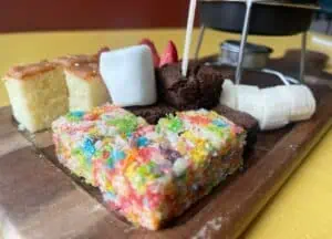 dessert platter with Rice Krispie treats, marshmallows and cake slices