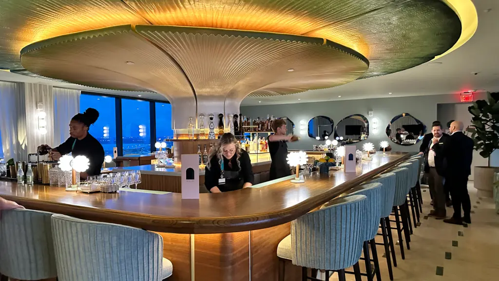a large bar with a canopy fixture at its center