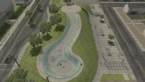 aerial view of a skate park with a long ramp