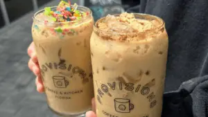 two coffee drinks covered in cereal