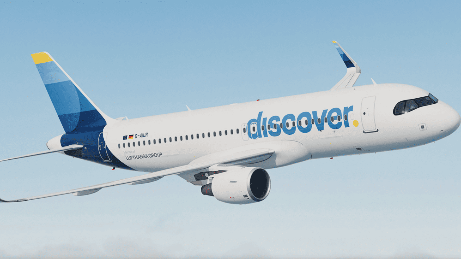 a plane in the sky with the word discover written on the side in blue font
