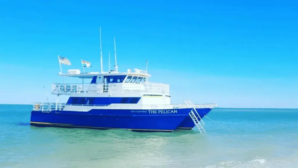 A cruise ship floating in brilliant blue water