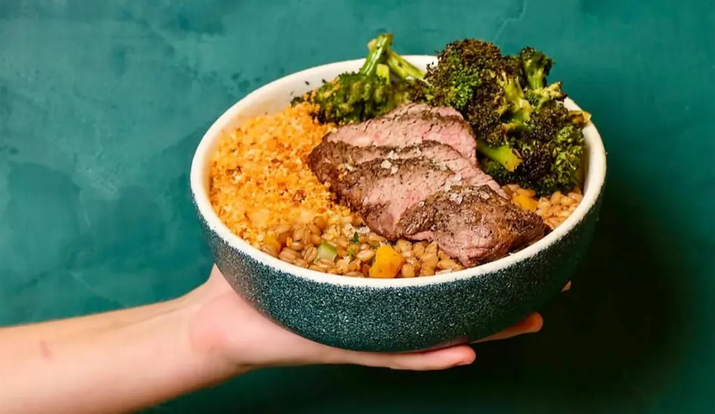 a protein bowl filled with steak