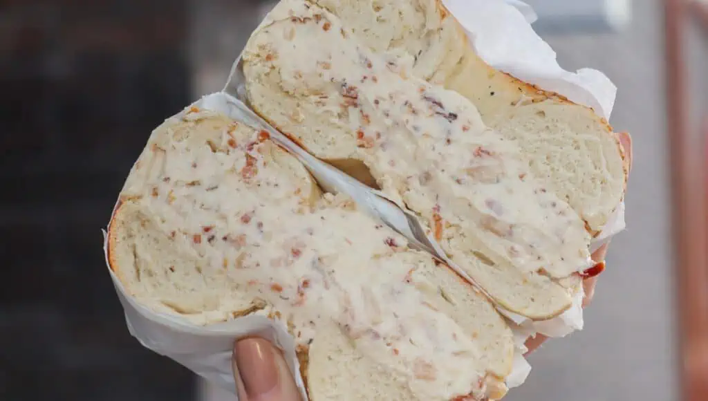 A bagel sandwich with cream cheese