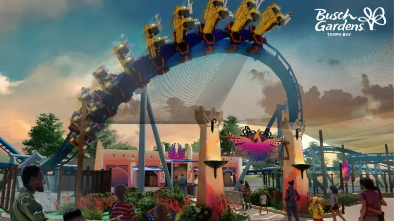 rendering of a roller coaster with a giant loop over a safari area.