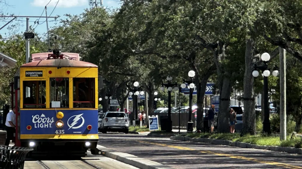 a streetcar on a brick street