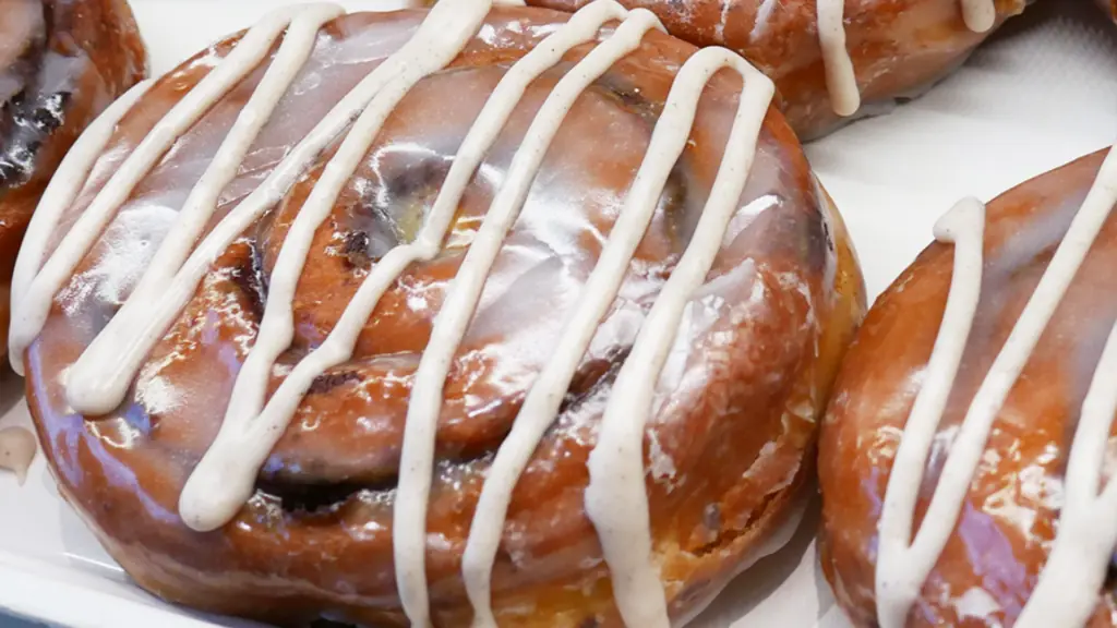 a large cinnamon roll with icing